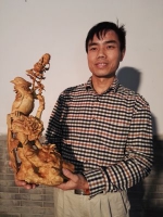 “朽木”也有第二春 他用木头雕刻花鸟倡导环保 - 重庆晨网