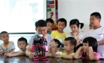 看到机器人跳舞 这些永川朱沱镇的孩子笑了 - 重庆晨网