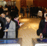 1月18日，上游新闻2018新品发布会，与会嘉宾使用人脸签到机器签到入场。_proc.jpg - 重庆晨网