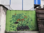 环卫工人摇身一变成为“艺术家”，在“牛皮癣”墙体巧绘四季 - 重庆晨网
