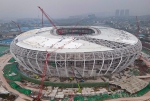 04：整个足球场屋面和幕墙安装预计明年3月完成。邓楷忠 摄 - 重庆晨网