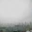 今日早上，中心城区出现短时强降水。华龙网-新重庆客户端记者 李文科 摄 - 妇联